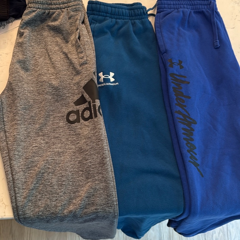 2 Under Armour sweatpants 1 pair of adidas (sold as bundle)